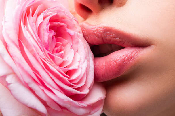 Girl open mouths. Natural beauty lips. Beautiful woman lips with rose. - Фото, изображение