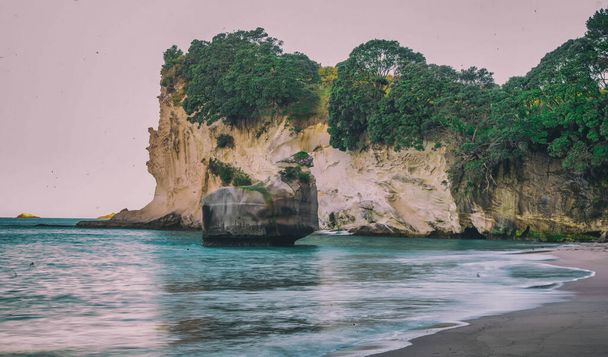 Cathedral Cove at sunset. It is a major attraction in Coromandel peninsula - Photo, Image