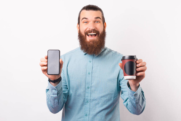 You can now order your coffee online by your phone. - Foto, afbeelding