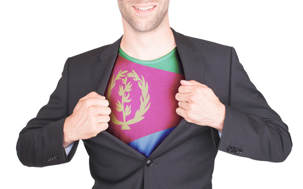 Hombre de negocios abriendo traje para revelar camisa con bandera
 - Foto, Imagen