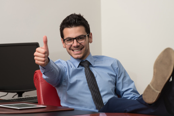 Young Caucasian Man With Glasses Showing Thumbs Up - Foto, Imagem