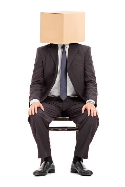 Businessman with box on head - Φωτογραφία, εικόνα