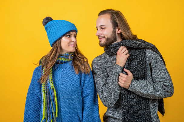 knitwear fashion for all family. cheerful couple in love. romantic relations of man and woman in winter. love can warm us. new year holiday and vacation. cozy and comfortable - Фото, изображение