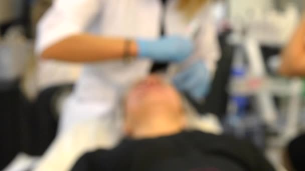 wazig achtergrond naald mesotherapie gezicht - Video