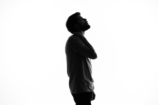silueta muži incognito studio životní styl světlo pozadí - Fotografie, Obrázek