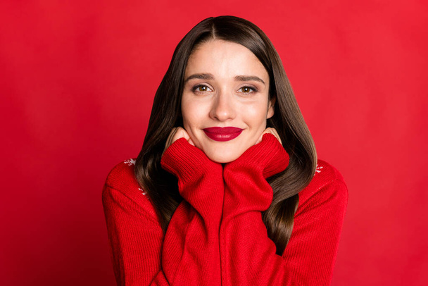 Portrait of attractive cheery content brown-haired girl wearing pullover isolated over bright red color background - Фото, зображення