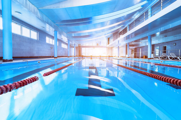 Lanes of a competition swimming sports pool in leisure centre - Fotoğraf, Görsel