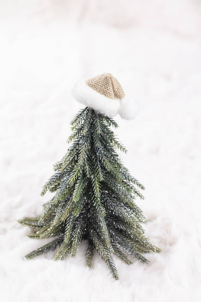 Christmas little trees and wool background. - Valokuva, kuva
