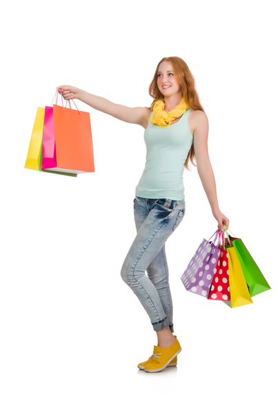 Woman after shopping spree on white - Φωτογραφία, εικόνα