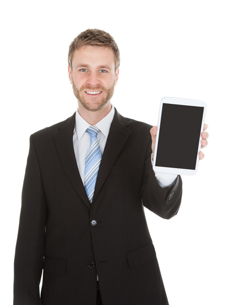 Businessman Displaying Digital Tablet - Foto, Imagem