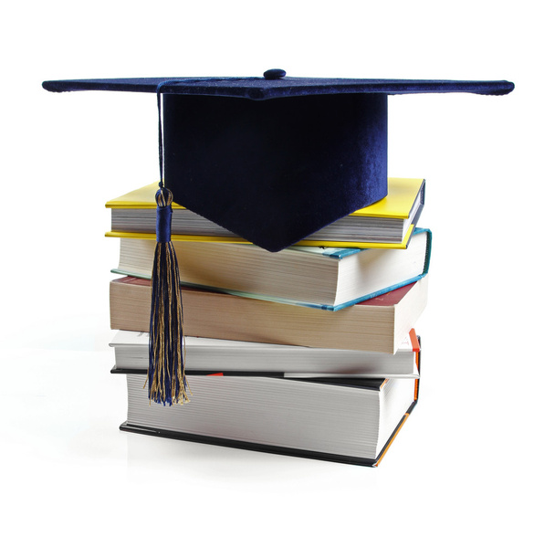 graduation hat and stack of books isolated on white - Foto, Imagem