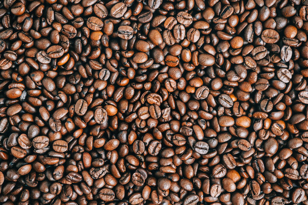 焙煎コーヒー豆の背景、トップビュー. - 写真・画像