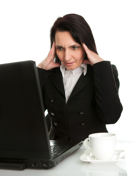 Stressful business woman working on laptop - Zdjęcie, obraz