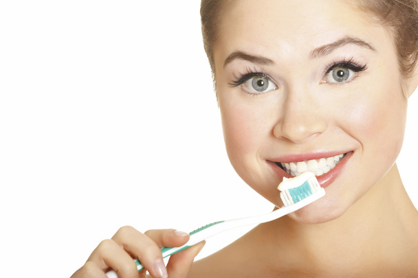 Belle fille brossant ses dents - Photo, image