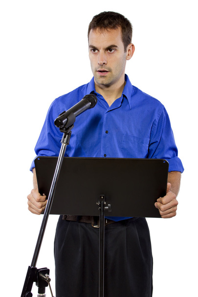 Businessman on podium making speech - Foto, afbeelding