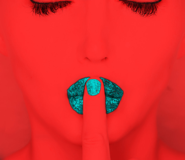 Finger on lips - Фото, изображение