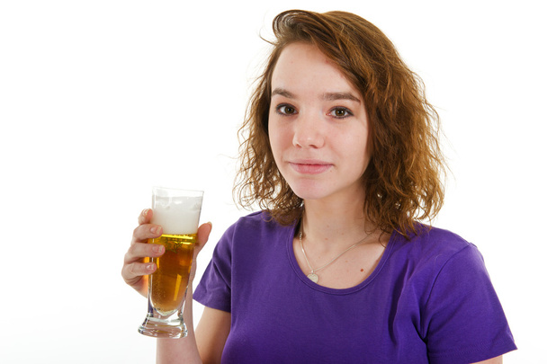 Young girl is drinking beer - Foto, imagen