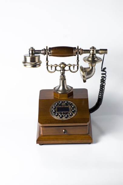 altes Holztelefon auf weiß - Foto, Bild