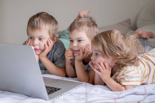Little kids having video chat via laptop at home lifestyle - Photo, Image