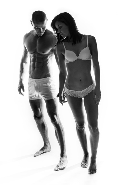 iki genç bir çift mükemmel vücut rakamlar gösteriliyor - Fotoğraf, Görsel