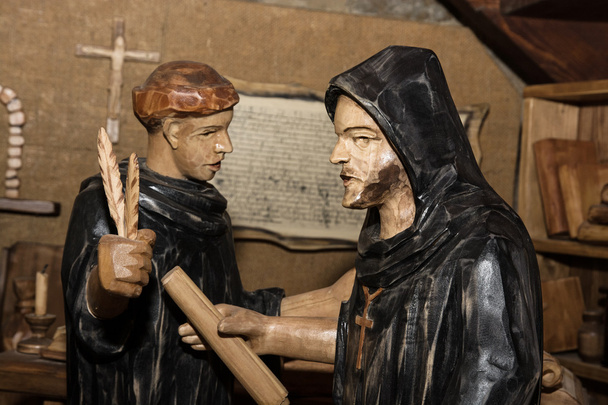 Wooden statues - monks in the monastery - Photo, Image