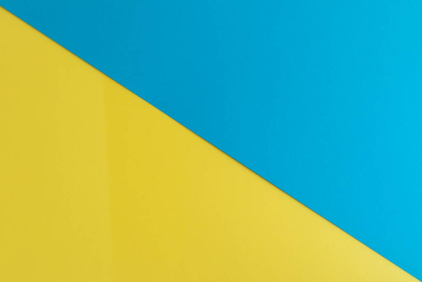 A closeup of a yellow and blue surface with space for text - Foto, Bild