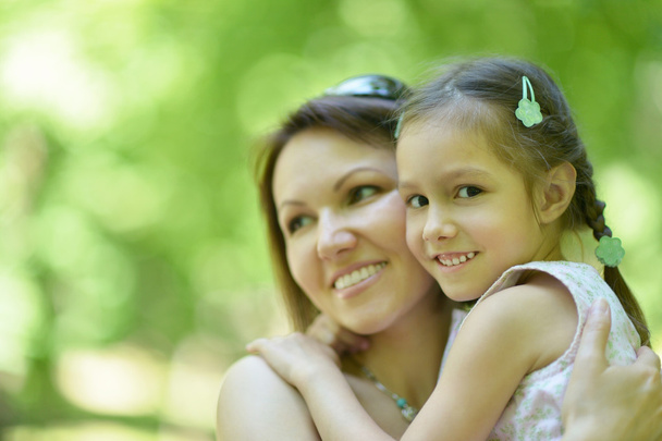 Mother with daughter  in summer - Photo, image