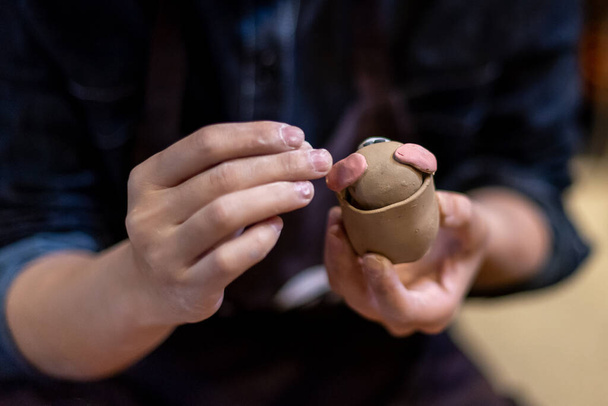 The process of making pottery in a Pottery Workshop - Photo, Image
