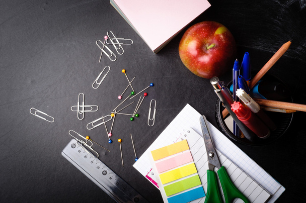 school supplies on the background of blackboard - Photo, Image
