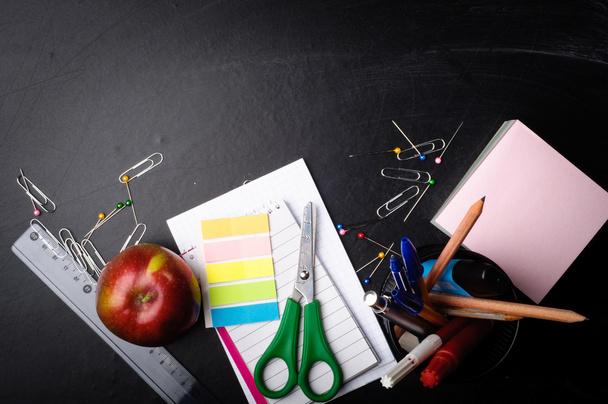 school supplies on the background of blackboard - Photo, Image