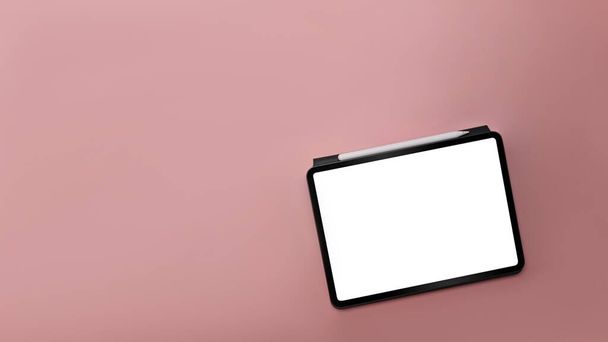 ピンクの背景に空白の緑とデジタルタブレットをモックアップ. - 写真・画像
