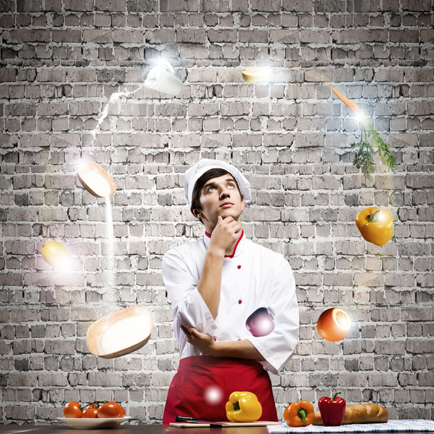 Cook at kitchen - Фото, зображення