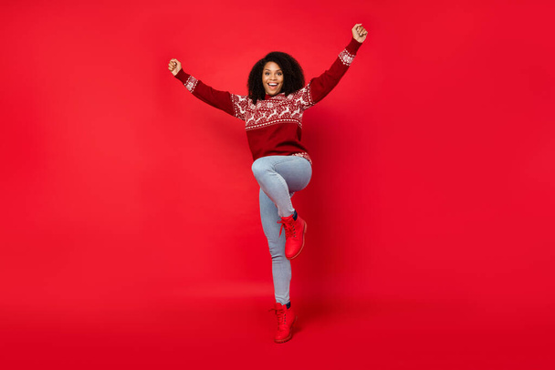 Full length body size photo woman smiling crazy gesturing like winner isolated vibrant red color background - Фото, изображение