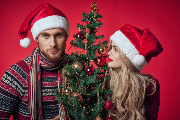 joyful man and woman new year holiday romance isolated background - Foto, afbeelding