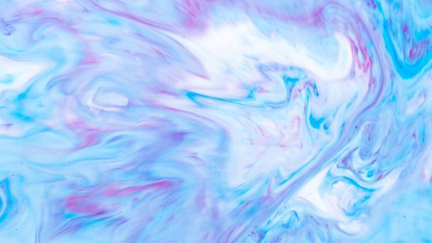 Fluid Art. Abstract liquid paint textured background with decorative spirals and swirls. Liquid pink blue backdrop. Trendy wallpaper - Foto, afbeelding