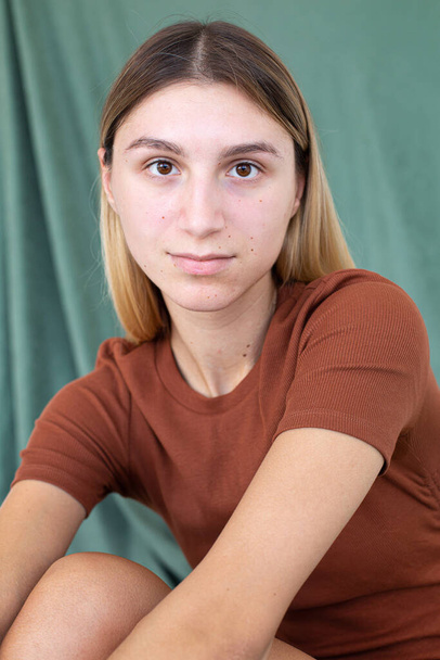 Portrait woman with blonde hair isolated on green - Φωτογραφία, εικόνα