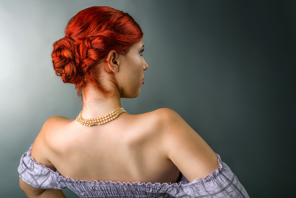 Young woman with elegant braided hairstyle - Foto, Bild