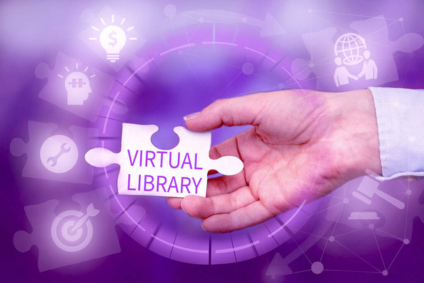Sign displaying Virtual Library. Business showcase collection of resources available on computer systems Hand Holding Jigsaw Puzzle Piece Unlocking New Futuristic Technologies. - Photo, Image