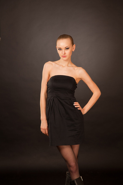 Elegant caucasian girl in black dress - 写真・画像