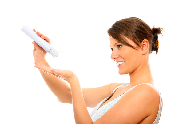 Young woman using body lotion - Photo, Image