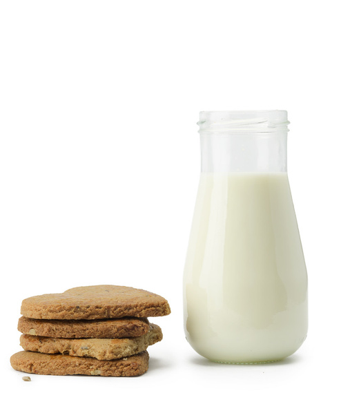 クッキーと牛乳瓶のスタック - 写真・画像