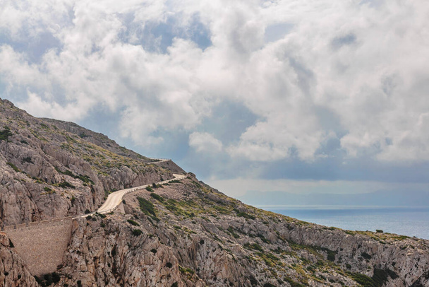 Landscape of rocky coast before a storm under gloomy dramatic sky (cape formentor). Mallorca. Balearic islands. Spain - Fotoğraf, Görsel