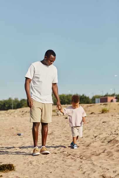 Father and Son on Beach - Photo, Image
