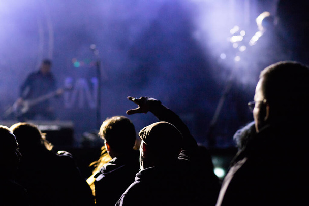 crowd at concert and silhouettes in stage lights - Photo, Image