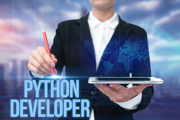 Inspiration showing sign Python Developer. Business concept responsible for writing serverside web application logic Lady In Uniform Standing Holding Tablet Typing Futuristic Technologies. - Photo, Image
