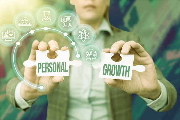 Conceptual display Personal Growth. Business idea improve develop your skills qualities Learn new materials Business Woman Holding Jigsaw Puzzle Piece Unlocking New Futuristic Tech. - Photo, Image