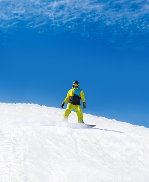 Snowboarder rutscht bergab - Foto, Bild