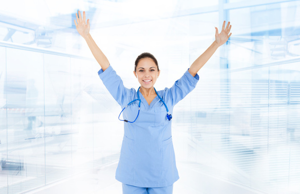 Doctor woman holding hands up - Valokuva, kuva