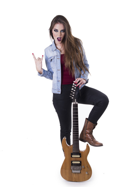 Gogeous blond rocker girl posing holding electric guitar - Foto, Bild