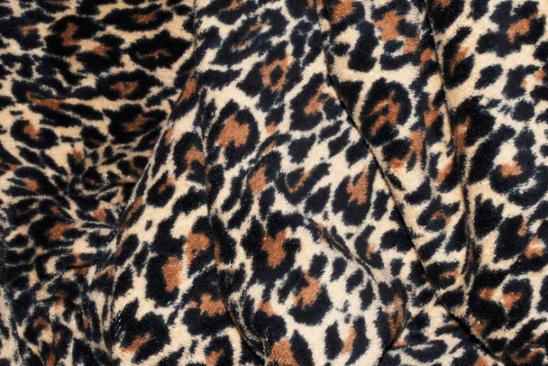Um tecido pele leopardo animal impressão fundo - Foto, Imagem